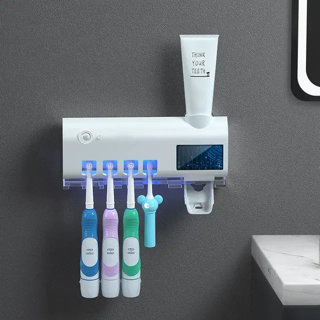 Inovatyvus dantų higienos įrenginys su UV sterilizatoriumi ir dantų pastos dozatoriumi