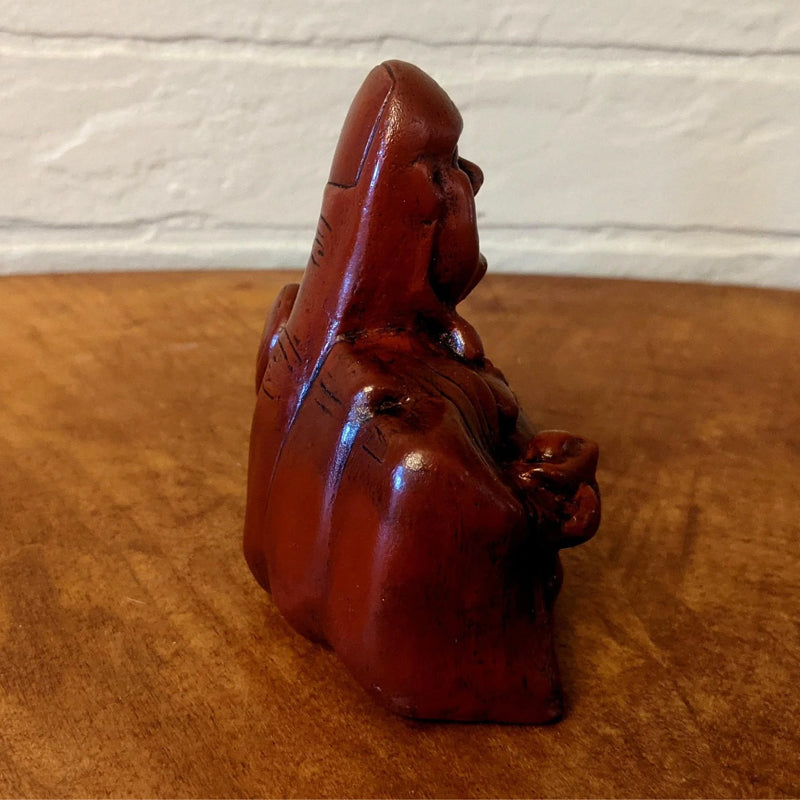 Sarkastiška Budos skulptūra