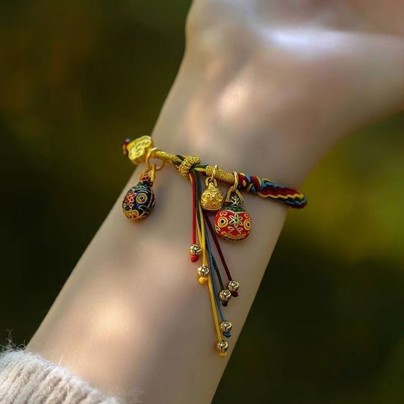 Reinkarnaciją simbolizuojanti apyrankė