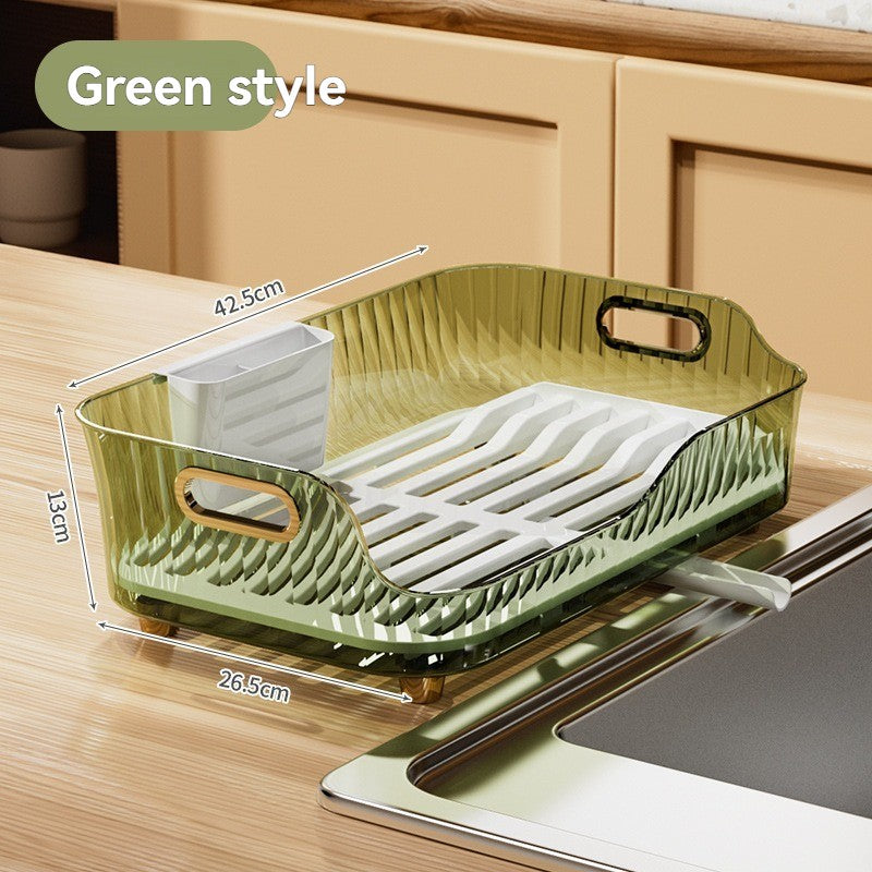 Žalias, skaidrus indas su baltu dugnu, matmenys 42,5 x 26,5 x 13 cm.