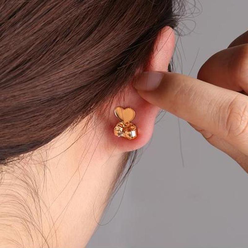 Specialus auskarus pakeliantis užsegimas