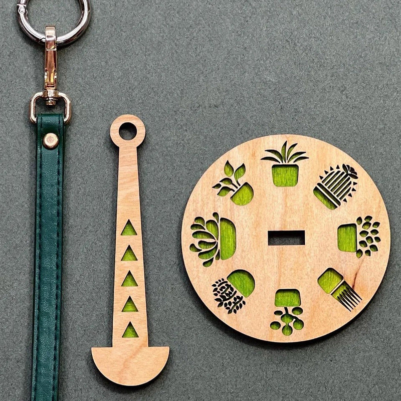 Pakabinamas siūlų ritės laikiklis