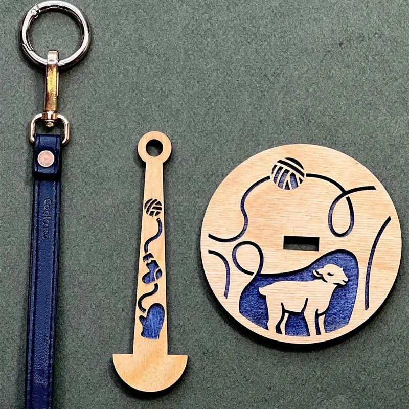 Pakabinamas siūlų ritės laikiklis