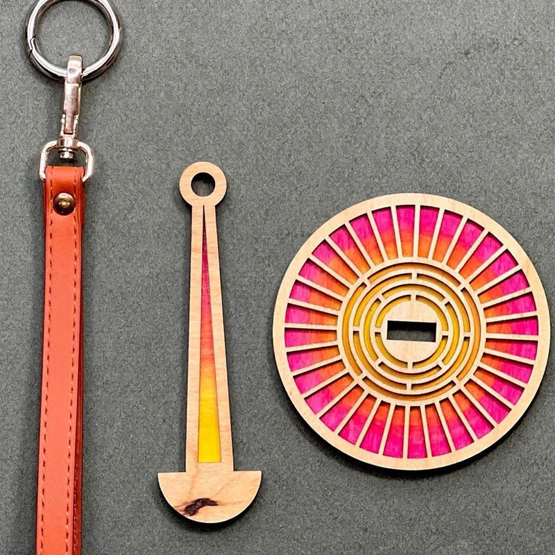 Pakabinamas siūlų ritės laikiklis