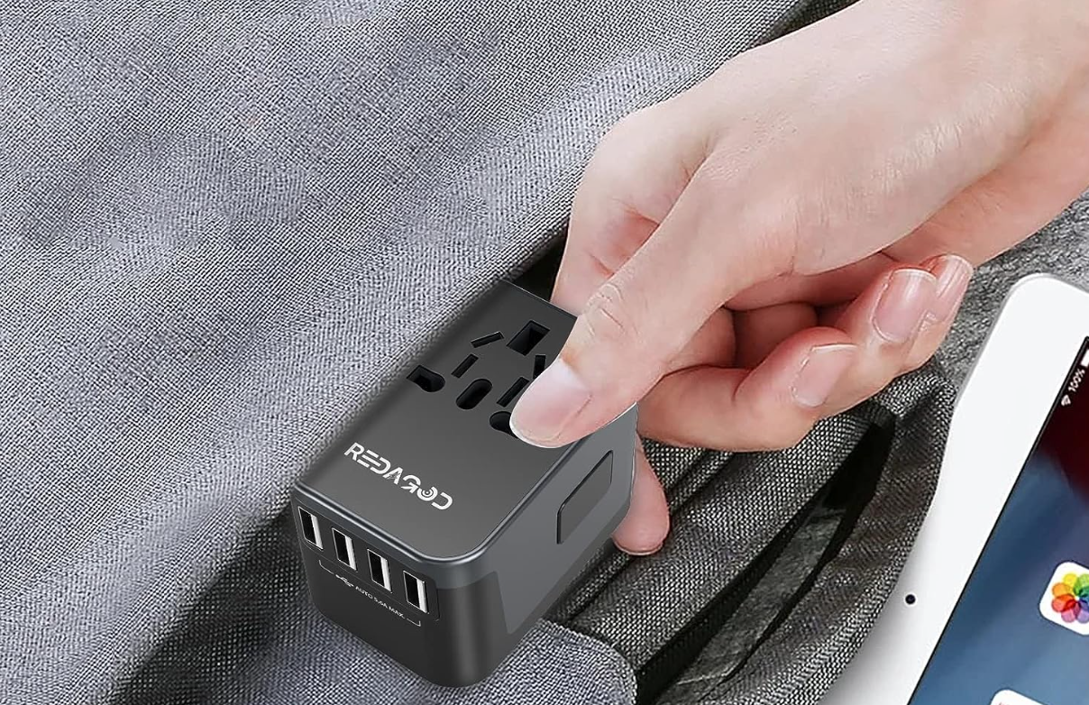 Universalus kelioninins USB adapteris